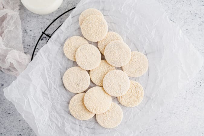 Shortbread cookies piled on neutral background